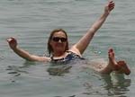Annie Soaking in the Dead Sea Israel