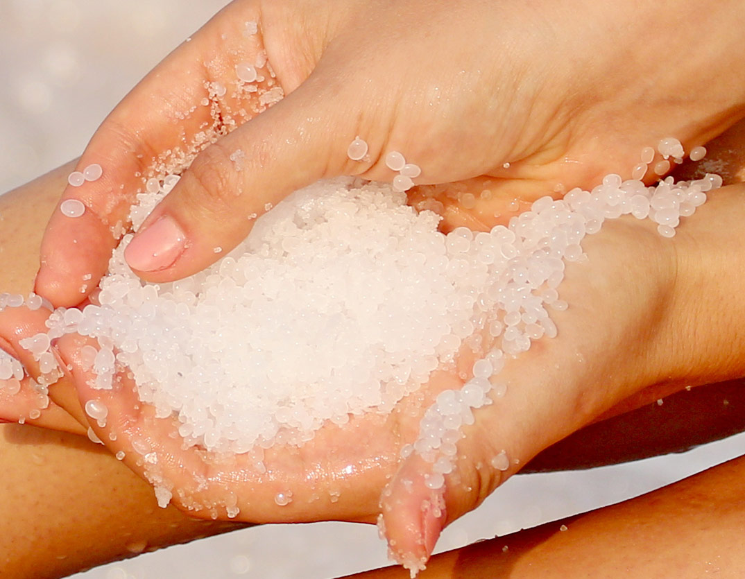 Hands holding Dead Sea salts Hands holding Dead Sea salts